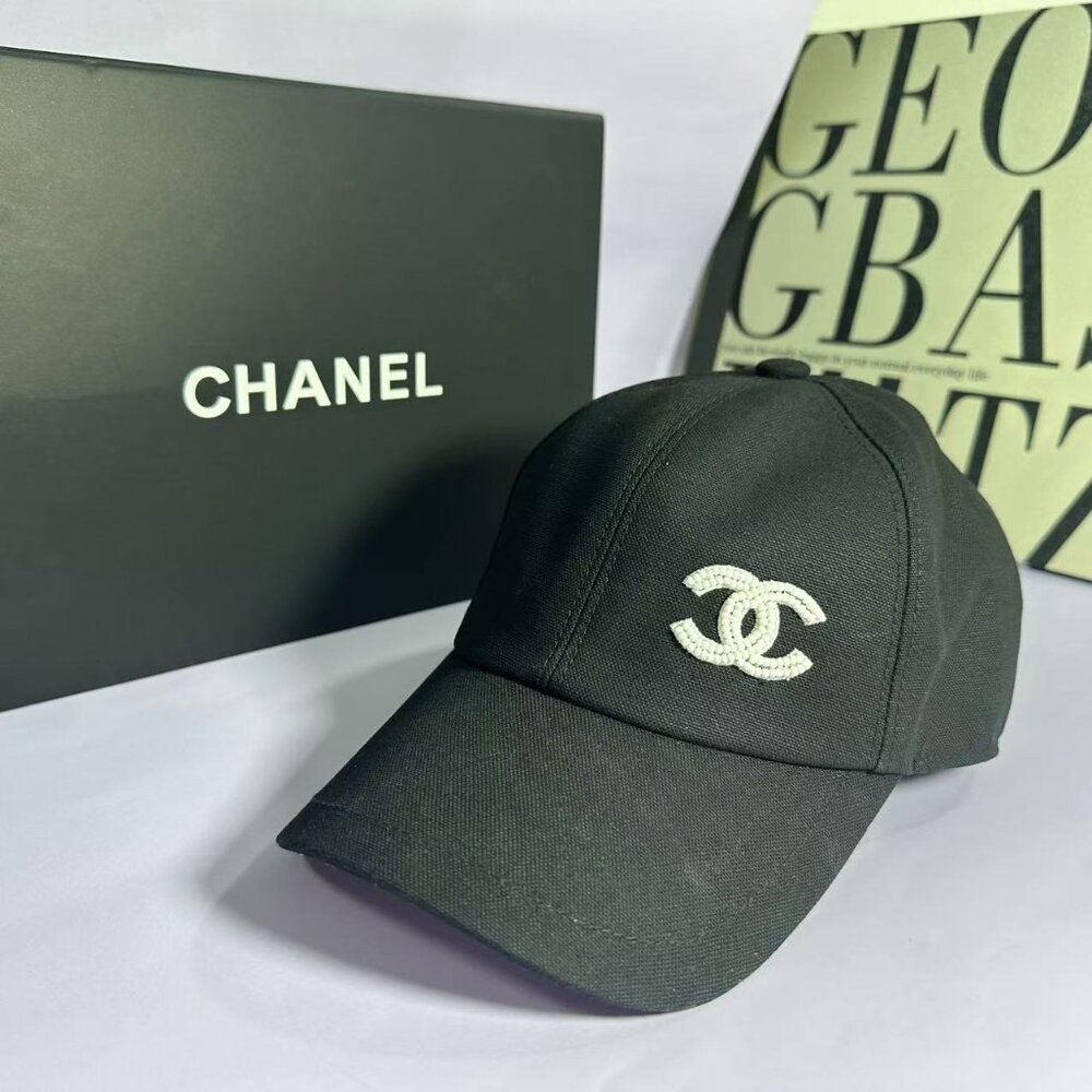 CHANEL Black Cap with Silver Logo
